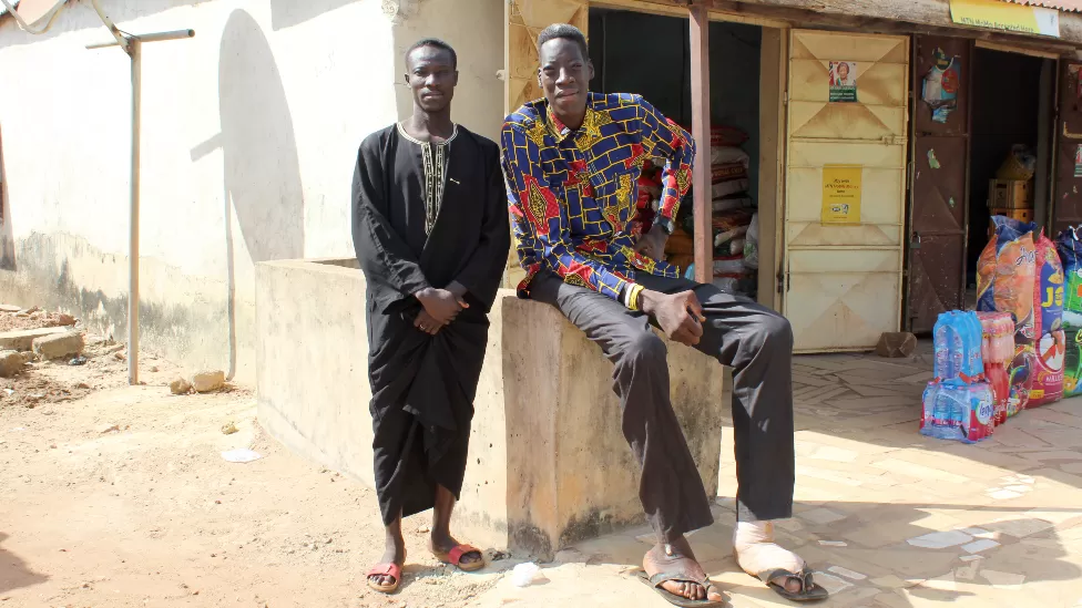 Sulemana Abdul Samed hamwe n'umuvandimwe we mukuru